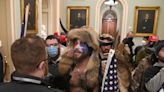 Jake Angeli, QAnon shaman from Arizona, among crowd near Pence's Jan. 6 evacuation route