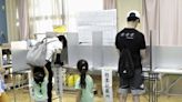 Voters in Tokyo cast ballots to decide whether to re-elect incumbent conservative as city's governor