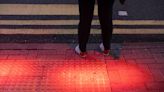 Hong Kong’s phone-obsessed pedestrians get some extra help at the crosswalk