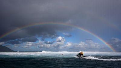 Paris Olympics water safety patrol 'like guardian angels' during surfing competition in Tahiti