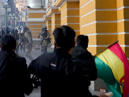 Military flees Bolivia government palace after coup attempt fails, general taken into custody