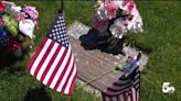 Hundreds of volunteers place flags at U.S. Air Force Academy cemetery ahead of Memorial Day
