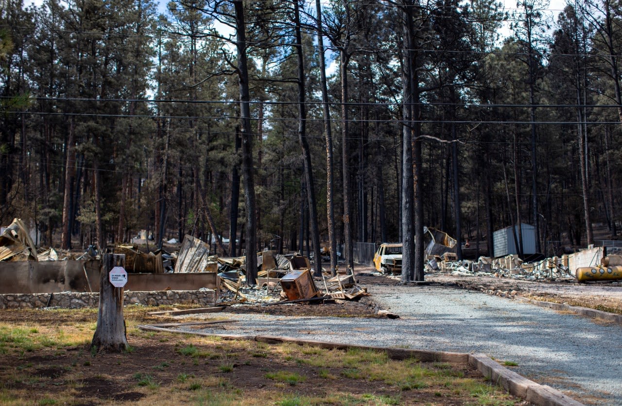 Team combs fire-ravaged New Mexico community for remains of the missing