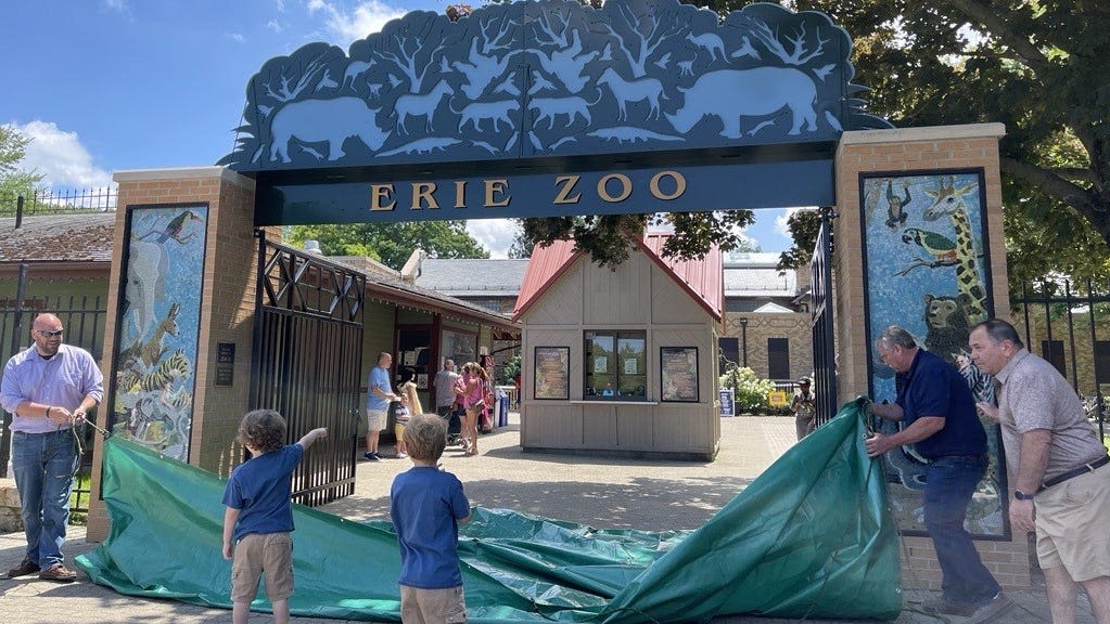 Entering the Erie Zoo: View new front entrance sign, mosaics which honor site's history