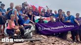 Rob Burrow: Man with MND scales Pen y Fan in wheelchair