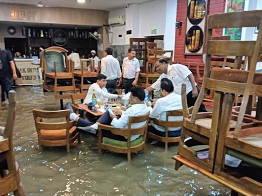 'But the party don’t stop’: Pic of people drinking in flooded Press Club in Delhi goes viral