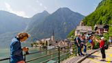 In a fairy-tale Austrian town, residents protest daily swarm of selfie-seeking tourists