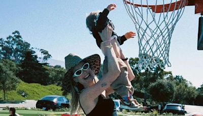 Behati Prinsloo Laughs While Helping Son Dunk a Basketball in Rare Family Photos: 'Stuff That Happened'