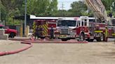 Crews working to put out fire at PADNOS Burton Recycling Center