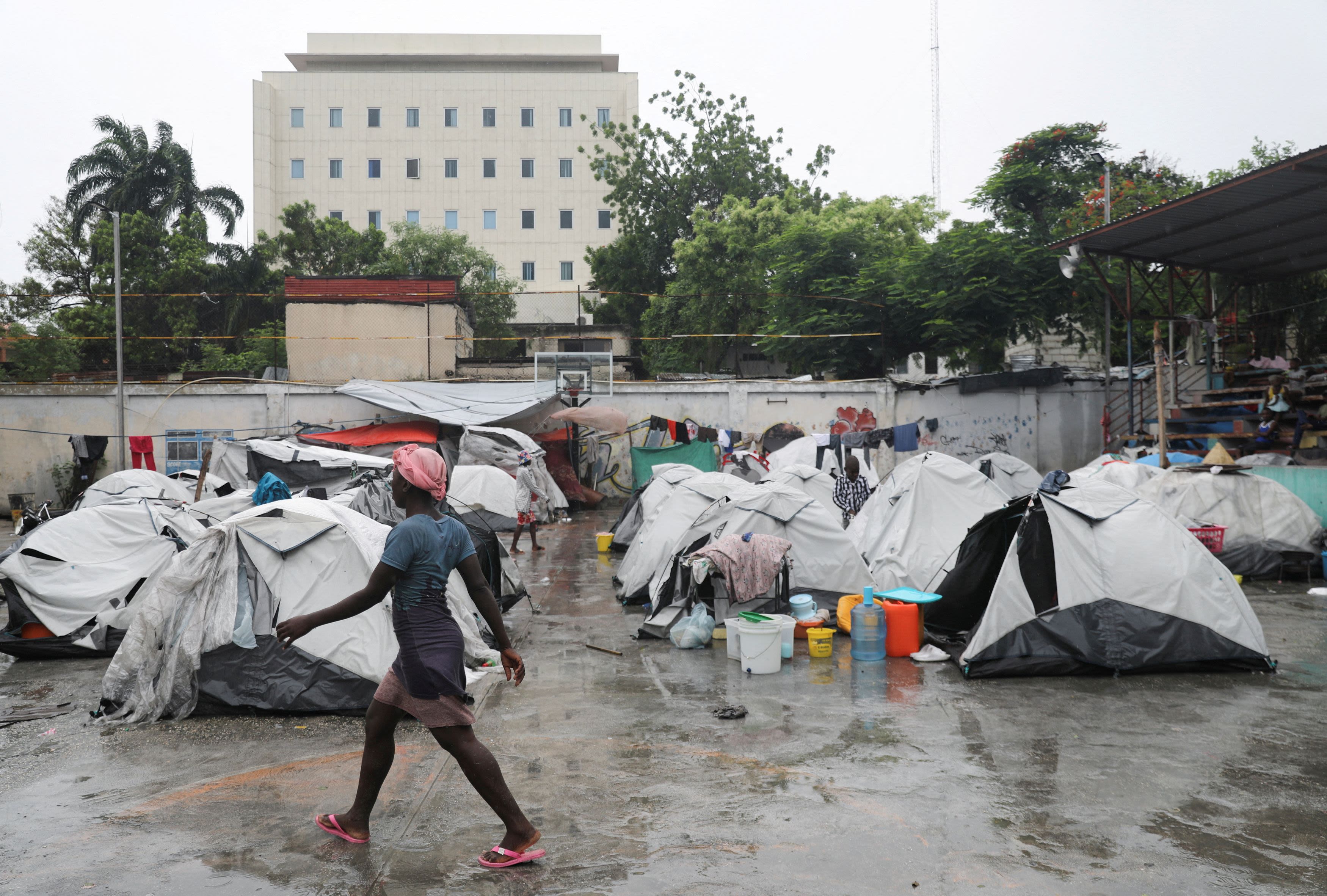 Opinion | As Haiti crumbles around us, we hold our communities together