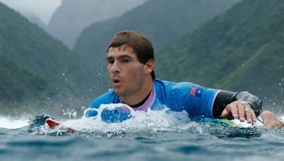 Olympic surfer rescued from drowning by brave lifeguards during dangerous storm