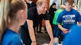 Adorable moment Prince Harry meets children who have lost their parents