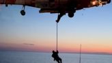 Coast Guard does special ops fast-rope training while hovering over the S.S. Badger