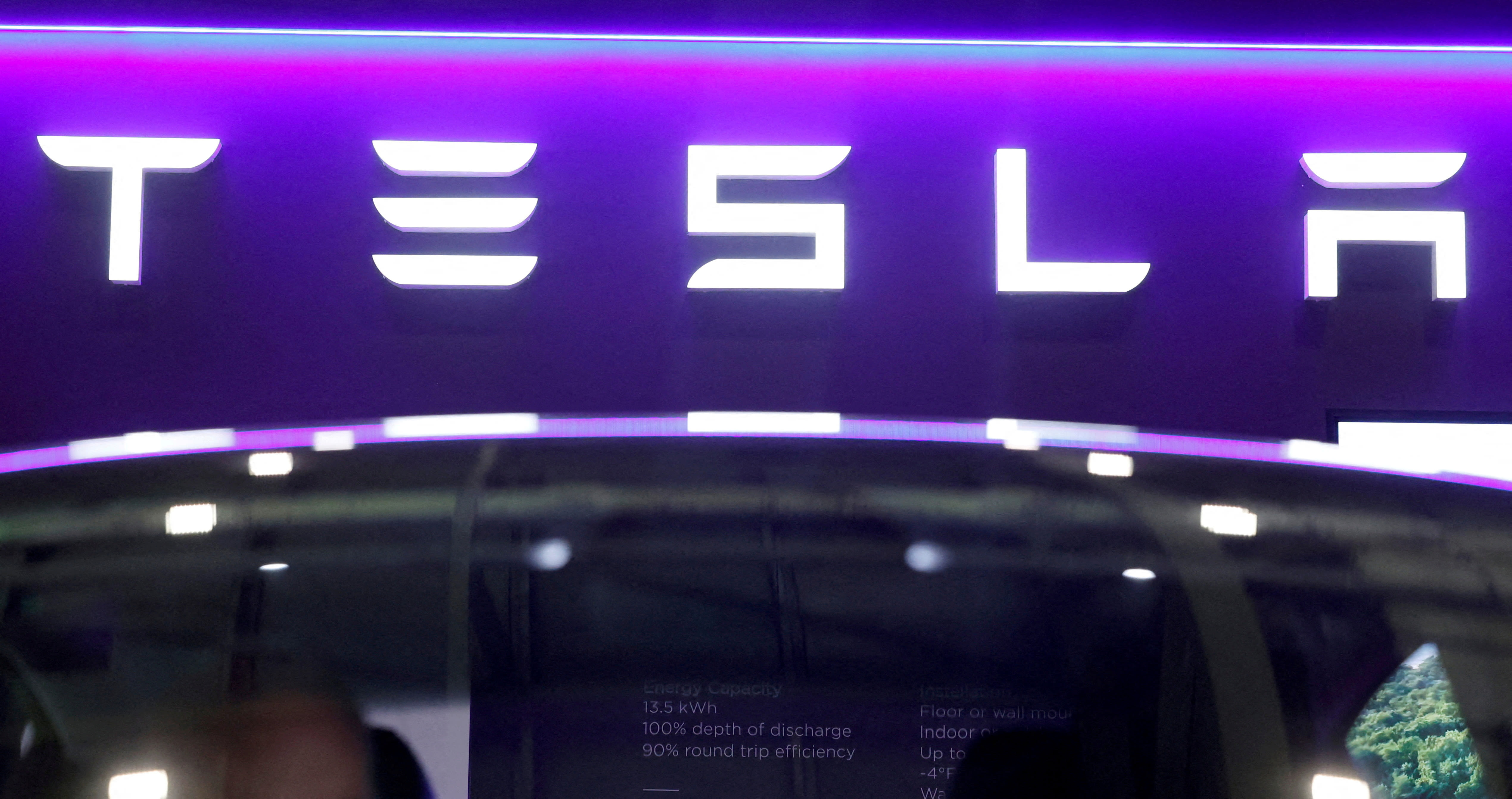 Tesla downgraded to Sell at UBS; valuation premium 'too significant,' analyst says