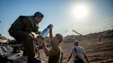 Israelis and Palestinians stare death in the face as they wait for the invasion