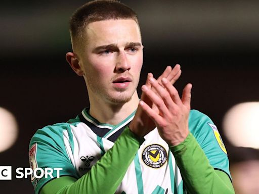 Matt Baker: Wales U21 skipper signs permanent Newport County deal