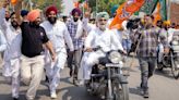 Indian democracy roars ahead on a Royal Enfield at blistering rural rally