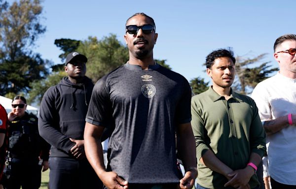 Hollywood star Michael B. Jordan poses with Dominic Solanke jersey