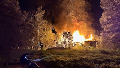 Traffic builds on U.S. 41 in Gibsonton while crews battle nearby house fire