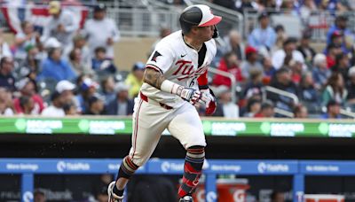 Miranda's 5 hits lead Twins to rain-shortened 12-3 win over Tigers