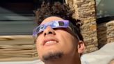 NFL superstar Patrick Mahomes shows off parenting skills during solar eclipse