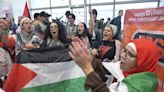 Palestinian athletes step on red carpet ahead of Paris Olympics