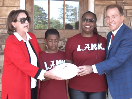 Coach Nick Saban and Miss Terry dedicate 21st Habitat for Humanity home