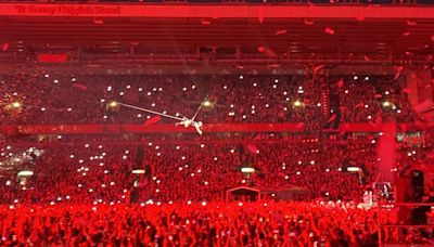 Pink takes to the sky at Anfield Stadium as she flies above the Kop