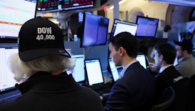 Dow surpasses 40,000, world stocks hit record amid rate cut hopes