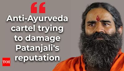 Baba Ramdev claims anti-Ayurveda cartel targeting Patanjali; trying to damage reputation - Times of India