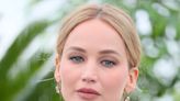 Jennifer Lawrence Dons Fiery Ballgown And Flip Flops To Cannes