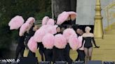 Millions surprised when Lady Gaga steps out from plume of pink feathers