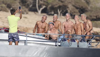 Dani Olmo spotted relaxing on boat in Ibiza with gang of lookalike pals