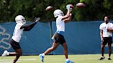 Detroit Lions re-sign C.J. Moore after yearlong gambling suspension