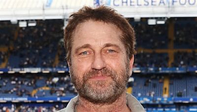 Gerard Butler appears in high spirits as he watches Chelsea FC thrash West Ham 5-0 at Stamford Bridge