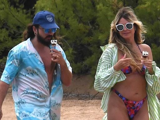 Heidi Klum cuddles up to Tom Kaulitz at the beach on family getaway