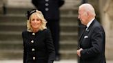 Photos show President Biden and First Lady Jill Biden paying tribute to the Queen at her funeral