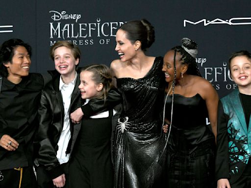 Angelina Jolie’s Motherhood Style Evolution: Muted Tones, Classic Silhouettes and More Coordinated Red Carpet Looks With Her Kids