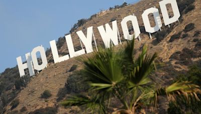 Hollywood workers union reaches pay, AI-use deal with top studios