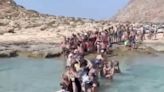 Terrified tourists told to disembark from ferry into the SEA in Greece