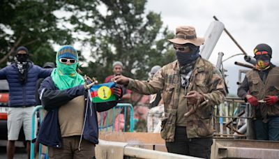 Macron flying to New Caledonia in bid to end violent insurrection