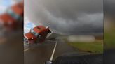 Watch Storm Chaser’s Run Get Cut Short After Wind Throws a Semi Truck Into His Path