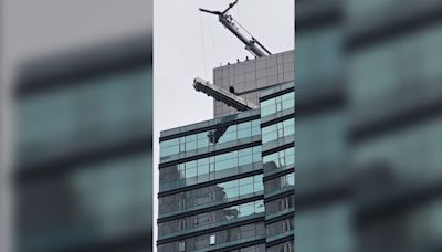 Workers rescued after swing stage ropes break outside 56th floor of downtown Toronto hotel