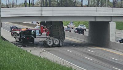 Video shows moment truck hauling gravel slams into overpass on I-94 in Detroit