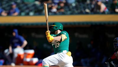 Rangers break open Game 2 late, survive late A’s rally to get doubleheader split