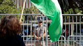 DeSantis lauds law enforcement and universities at a UF press conference as protesters demonstrate