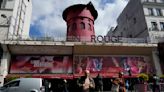 Caen aspas de molino del Moulin Rouge parisino