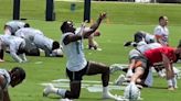 Don't like playlist at Dolphins practice? Blame practice player of day (the guy in orange)