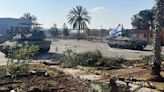 Israeli forces seize the Gaza side of Rafah, as Hamas truce talks resume in Egypt