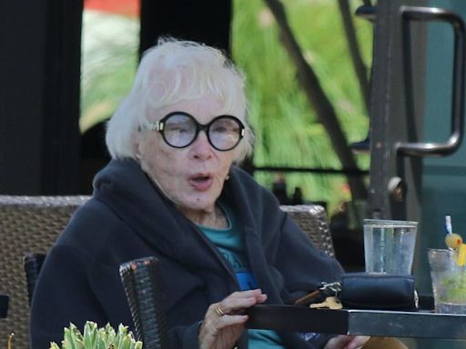 Shirley MaClaine, 90, pictured visiting Malibu restaurant with friend